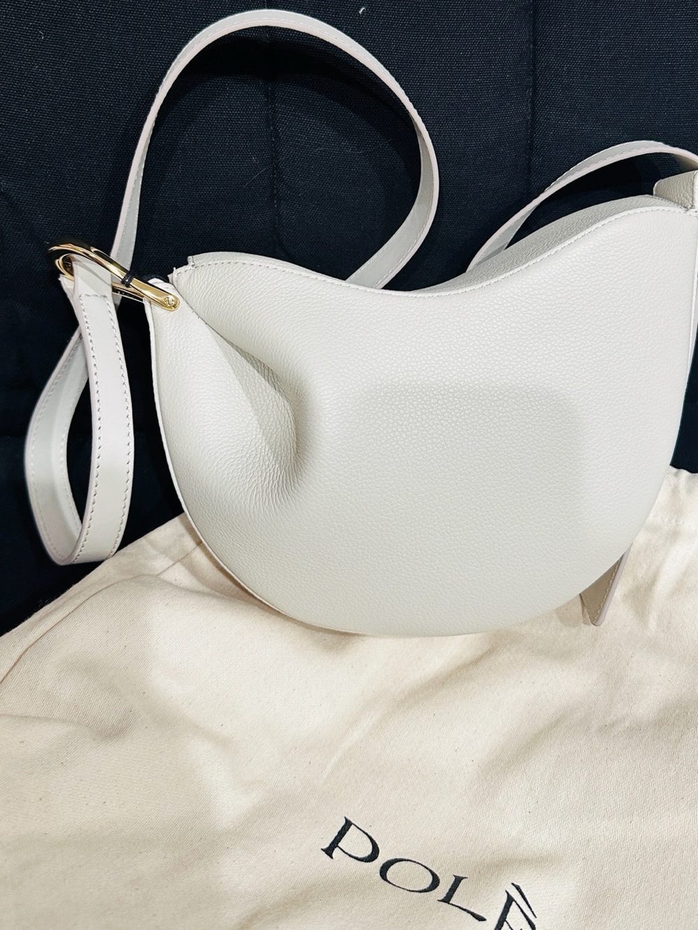 Polene White Crescent Pebbled Leather Shoulder Bag with Gold Accents